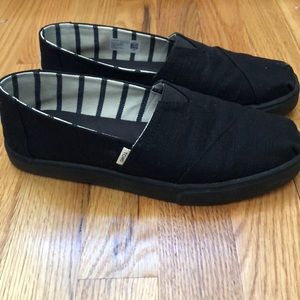Toms black on black shoes.
